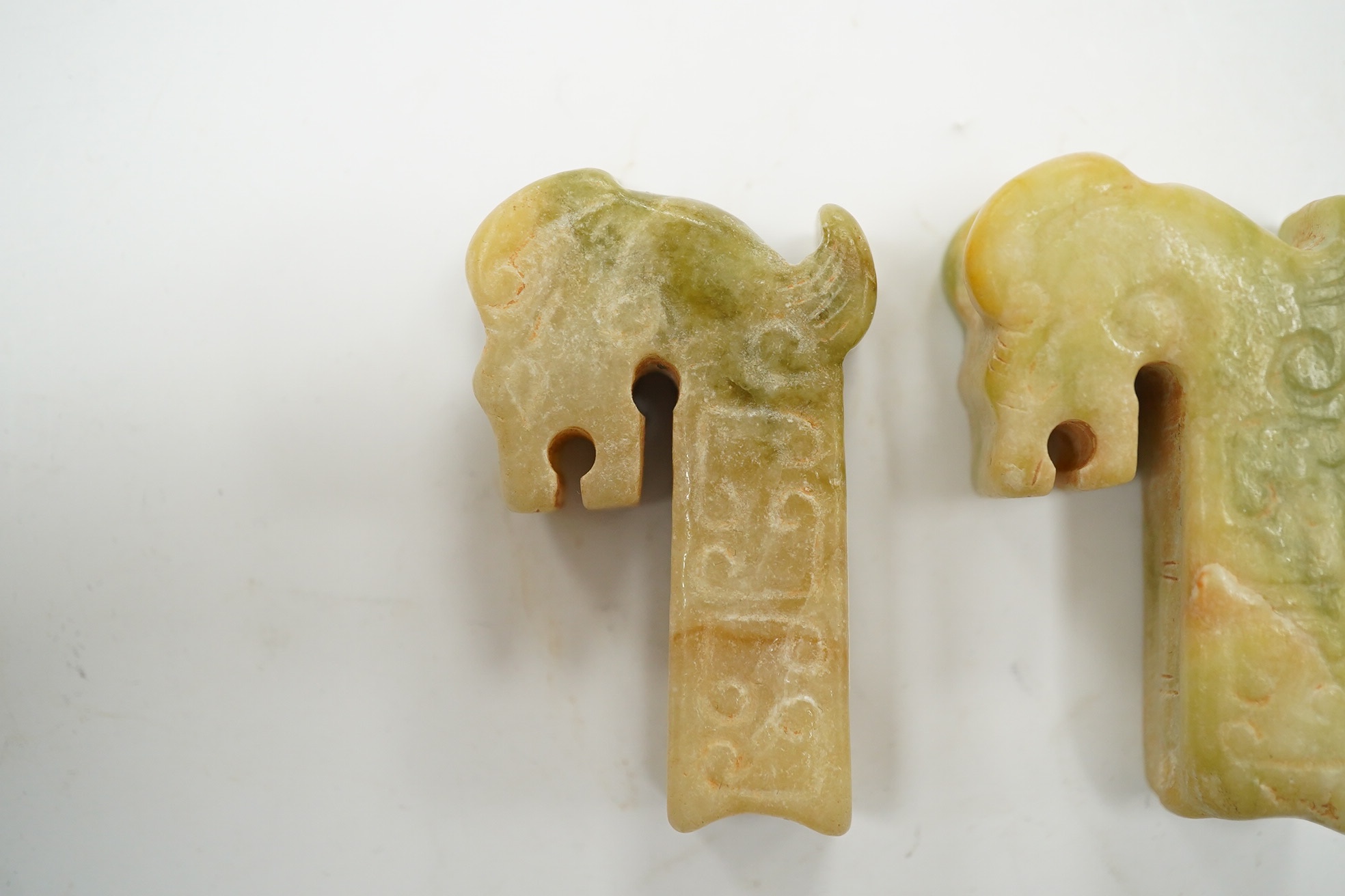 Two Chinese jade carvings in the form of animals, both 5cm high. Condition - good